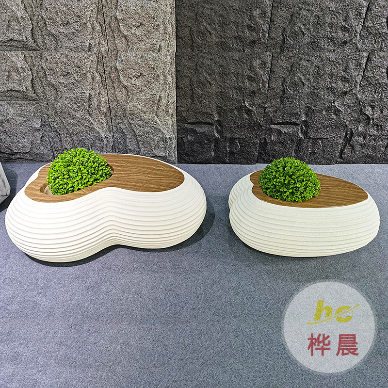 玻璃鋼鵝卵石休閑座椅軟包沙發(fā)現(xiàn)代美陳室內(nèi)裝飾商場造型石頭坐凳